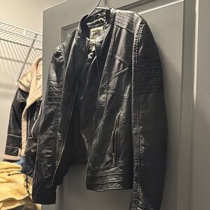 Black Leather Motorcycle Jacket with Asymmetrical Zipper and Smooth Finish